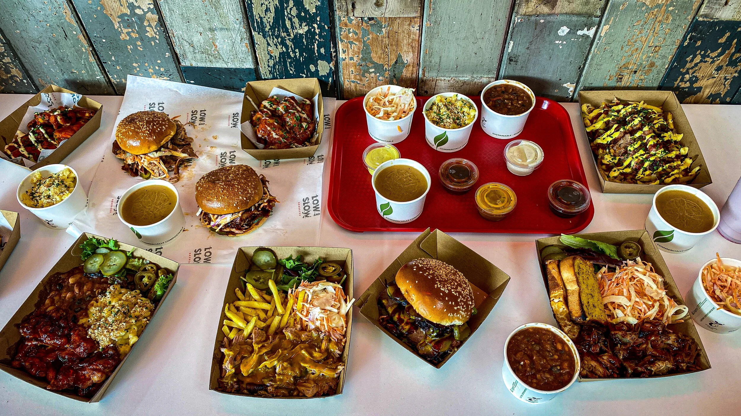 A spread of Low and Slow barbecue dishes